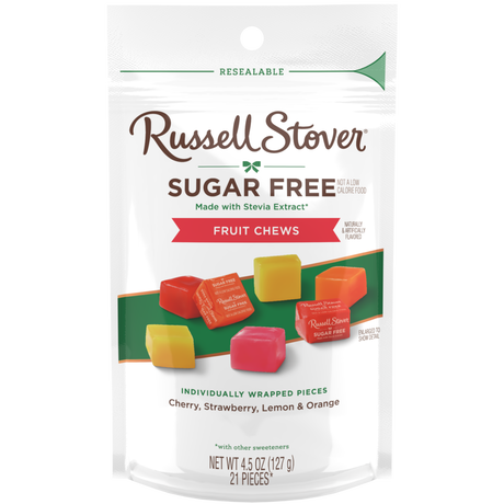A resealable bag of Russell Stover Sugar Free Fruit Chews, featuring individually wrapped pieces in cherry, strawberry, lemon, and orange flavors, is displayed with colorful candies on a white background.