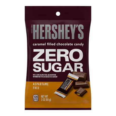 A maroon bag of Hershey's Zero Sugar caramel-filled chocolate candy displays the product name prominently, with images of chocolate pieces and nutritional information highlighted.