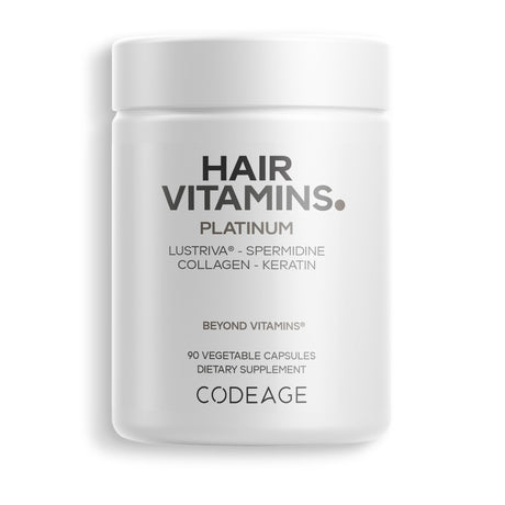 A white container labeled "HAIR VITAMINS. PLATINUM" with details about ingredients like Lustriva, Spermidine, Collagen, and Keratin, indicating it contains 90 vegetable capsules as a dietary supplement.