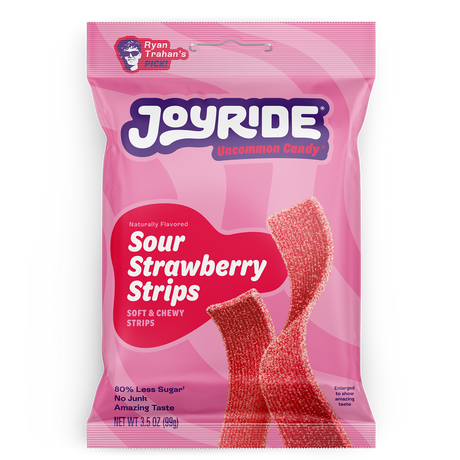 A pink package of Joyride Sour Strawberry Strips features the product name prominently, with a description of being soft and chewy, and highlights that it contains 80% less sugar.