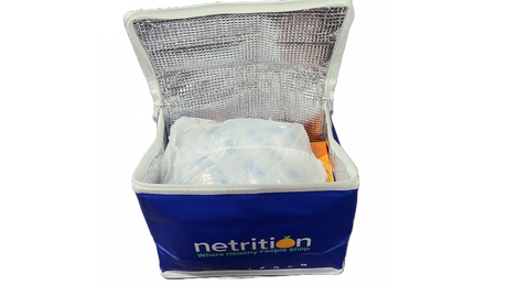 Open blue Netrition insulated cooler bag filled with packaged food items.