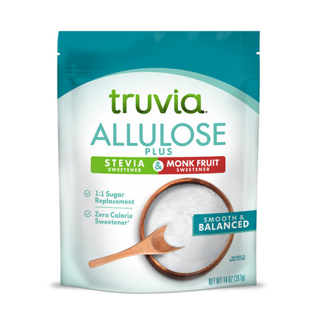 A teal and white package of Truvia Allulose Plus sweetener features a bowl of white granules and a wooden spoon, highlighting its zero-calorie content and 1:1 sugar replacement.