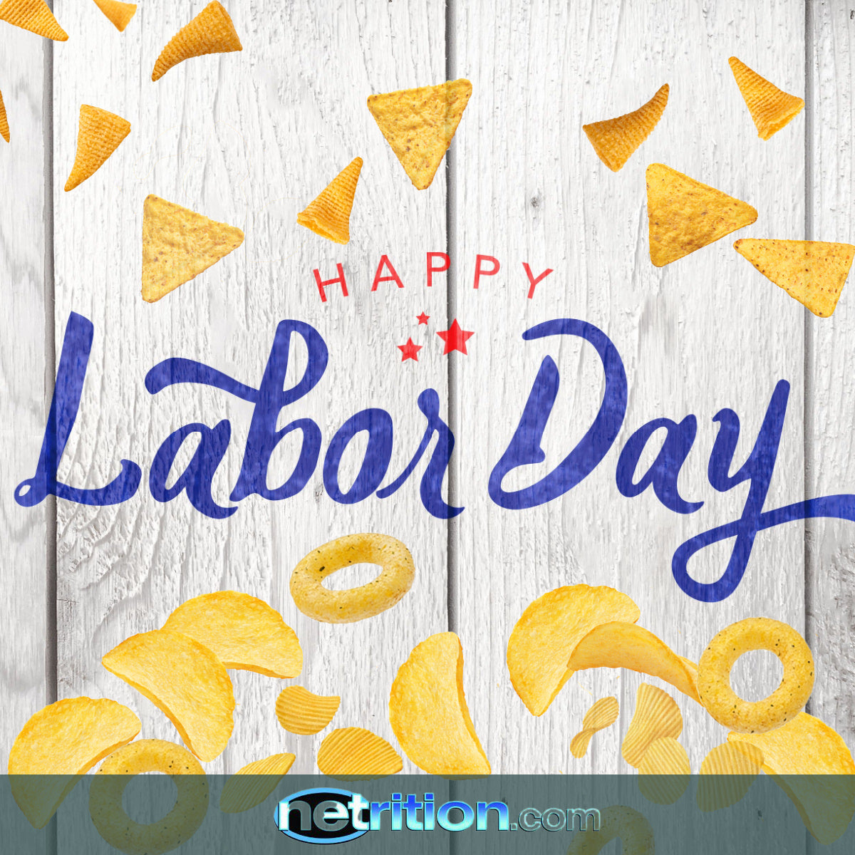 Colorful snacks, including chips and rings, are scattered around the text "Happy Labor Day" in bold blue and red, set against a rustic wooden background.