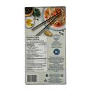 A nutrition facts label is displayed on the back of a food package, featuring details about calories, ingredients, and cooking instructions, alongside a plate of shrimp pasta and chopsticks.