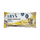 A package of Lily's White Chocolate Style Baking Chips, featuring a colorful design, highlights "No Sugar Added" and "Gluten Free" labels, with several white chocolate chips depicted on the front.