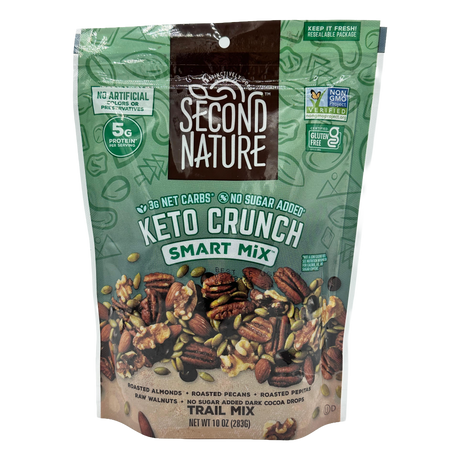 A resealable bag of Second Nature Keto Crunch Smart Mix, featuring a blend of roasted almonds, pecans, walnuts, and pepitas, with labels highlighting low net carbs and no added sugar.