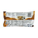 The back of a package of Lily's Salted Caramel Chocolate Chip Cookies displays nutritional information, ingredients, and a photo of the cookies, set against a light brown background.
