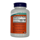 A white supplement bottle with a blue cap displays nutritional information, highlighting magnesium content and serving details, set against a black background.