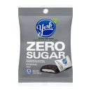 A gray bag of York Zero Sugar Peppermint Patties features the brand logo, highlights "ZERO SUGAR" prominently, and indicates it is aspartame-free, containing 80 calories per serving.