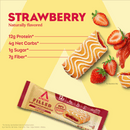 A strawberry-flavored protein bar is shown with fresh strawberries and strawberry sauce, highlighting its nutritional information: 12g protein, 4g net carbs, 1g sugar, and 7g fiber.