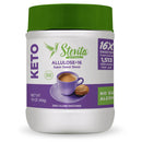 A white jar of Stevita Naturals Allulose sweetener features a green lid, purple accents, and an illustration of a coffee cup with a cookie, highlighting its keto-friendly and non-GMO attributes.