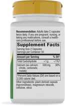 A white bottle with a yellow cap displays nutritional information for a dietary supplement, including serving size, ingredients, and recommendations for use.