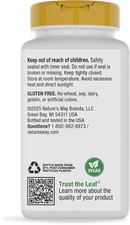 A white bottle with a yellow cap displays safety instructions, allergen information, and a QR code, indicating it contains gluten-free, vegan contents from Nature's Way Brands.