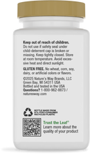 A white supplement bottle with a gold cap displays safety warnings, storage instructions, and a gluten-free label, along with a QR code for product information.