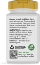 A white bottle with a gold cap displays safety instructions, allergen information, and a vegan label, emphasizing its gluten-free content and storage guidelines for a dietary supplement.