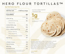 Nutritional facts for Hero Flour Tortillas are displayed, showing serving size, calories, and ingredients, with a stack of soft, round tortillas in the foreground.
