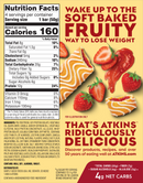A colorful nutrition label for a soft-baked fruity bar features bold text highlighting its weight loss benefits, alongside images of strawberries and the product's ingredients and nutritional information.