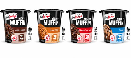 Four varieties of FlapJacked Mighty Muffin are displayed, including Double Chocolate, Peanut Butter, Chocolate Peanut Butter, and S'mores, each highlighting 20 grams of protein and a quick preparation time.