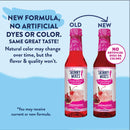 Two bottles of Skinny Mixes Grenadine syrup are shown side by side, labeled "OLD" and "NEW," highlighting the new formula with no artificial dyes or colors, against a light blue background.