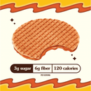 A round, caramel-filled waffle with a bite taken out of it is displayed against a bright yellow background, featuring nutritional information highlighting 3g sugar, 6g fiber, and 120 calories per serving.