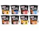 Eight varieties of FlapJacked Mighty Muffins are displayed in individual cups, featuring flavors like Banana Chocolate Chip, Blueberry, and S'mores, each labeled with protein content and preparation instructions.