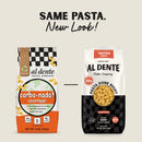 Two pasta packages from Al Dente Pasta Company are displayed side by side, one labeled "carba-nada! cavatappi" and the other "protein pasta," highlighting a new design with nutritional information.