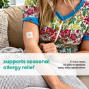 A person wearing a floral-patterned shirt sits on a couch, showing a patch on their arm that provides seasonal allergy relief, with text highlighting its benefits and ease of use.