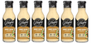 Six bottles of G. Hughes Honey Dijon flavored dressing are lined up, each featuring a black label with white text, highlighting that the product is zero sugar, gluten-free, and dairy-free.