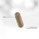 A transparent capsule filled with a brown substance measures 0.98 inches, with a note indicating that natural color variation may occur.