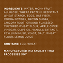 A list of ingredients for a food product, including items like water, monk fruit, eggs, and cocoa powder, with notes on allergens such as egg and wheat, and manufacturing details regarding soy.