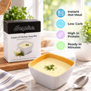 Inspire Cream of Chicken Soup Mix beside the seven-packet box. A low-carb, high-protein instant hot meal ready in minutes.