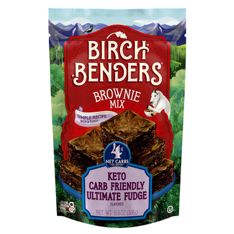 A colorful package of Birch Benders Brownie Mix features rich, fudgy brownies on the front, highlighting its keto-friendly recipe with 4 grams of net carbs per serving and a scenic mountain backdrop.