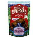 A colorful package of Birch Benders Brownie Mix features rich, fudgy brownies on the front, highlighting its keto-friendly recipe with 4 grams of net carbs per serving and a scenic mountain backdrop.