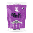 A purple bag of Lakanto Monkfruit Sweetener with Erythritol features bold text highlighting its sugar-free, zero-calorie, and keto-friendly attributes, suitable for baking.