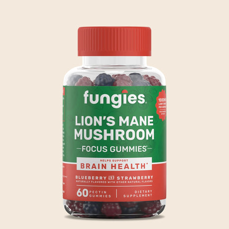 A clear bottle of "Fungies Lion's Mane Mushroom Focus Gummies" featuring a red lid, with a label highlighting blueberry and strawberry flavors, and stating it supports brain health, set against a light beige background.