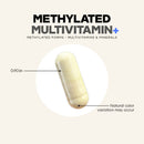 A clear capsule containing a multivitamin is shown against a light background, with labels indicating its size of 0.90 inches and noting potential natural color variations.