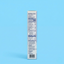 A nutrition facts label on a product box displays serving size, calories, and nutrient information against a light blue background.