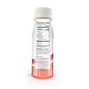 A plastic bottle of protein drink is shown from the back, displaying the nutrition facts, ingredients, and a warning about dietary use, with a white cap and a pink label at the bottom.