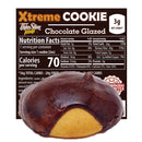 A chocolate-glazed cookie sits in front of a nutrition label, highlighting its low calorie count of 70 and high fiber content of 20 grams, emphasizing its appeal for health-conscious consumers.