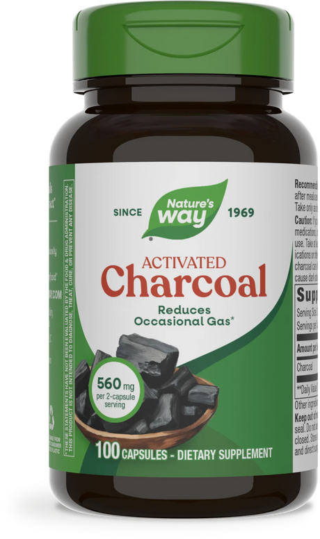 A dark brown bottle of Nature's Way Activated Charcoal dietary supplement, featuring a green cap, displays information about reducing occasional gas and contains 100 capsules, each with 560 mg per serving.