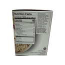 A nutrition facts label on a product box shows serving size, calories, and various nutrients, with ingredients listed, emphasizing protein content and allergen warnings.