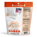 A colorful package of Ashapops popped water lily seeds features a photo of a mother and son, with nutritional information and a note about the product's cultural significance and health benefits.