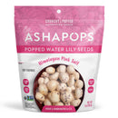 A colorful packaging of Asha Pops features popped water lily seeds with Himalayan pink salt, highlighting its gluten-free, vegan, and handcrafted qualities, along with a calorie count of 120 per serving.