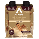 A four-pack of Atkins high protein iced tea latte shakes in chai tea flavor, featuring nutritional information and images of cinnamon sticks and star anise on the packaging.