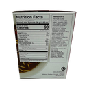 A nutrition facts label for a food product, detailing serving size, calories, and ingredient information, displayed on the back of a box with a bowl of soup in the background.