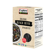 A box of Explore Cuisine Organic Black Bean Spaghetti displays a bowl of cooked spaghetti with colorful vegetables, highlighting its high protein content and nutritional information on the side.