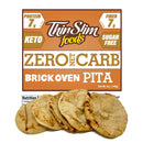 A package of Thin Slim Foods Zero Net Carb Brick Oven Pita, featuring five round, lightly toasted pitas in front of a colorful label highlighting its keto-friendly, sugar-free, and high-protein attributes.