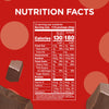 A nutrition facts label displays details about calories, fats, carbohydrates, and vitamins for a chocolate product, set against a bright red background with chocolate pieces.