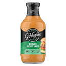 A clear bottle of G. Hughes Burger Secret Sauce, featuring a black label with green accents, displays nutritional information and a burger image, highlighting its zero sugar and gluten-free attributes.