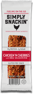 A snack package for Simply Snackin' Chicken 'n Cherries with BBQ seasoning, featuring a textured meat bar, nutritional information, and a gluten-free label, set against a white background.